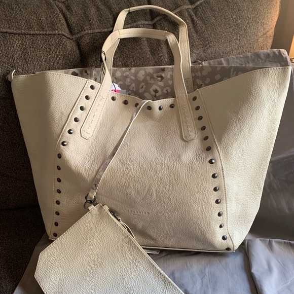 Liebeskind Handbags - Authentic Liebeskind Reversible leather tote/pouch